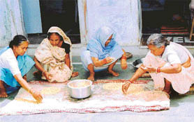 Food for independence: The members of the Aamar Bari guild making wadis