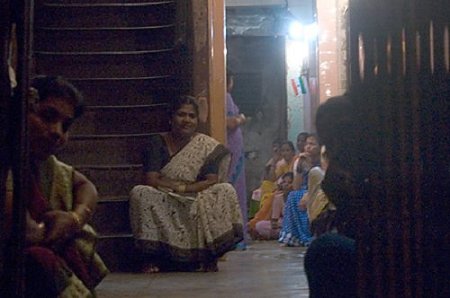 This brothel keeper and her slaves are in a red-light district in Mumbai, India. The women and girls used in prostitution may be exploited 10 to 40 times a night, sometimes keeping as little as 20 rupees (less than 50 cents) per encounter. The Madam takes the biggest cut for herself, then pays the landlord, the pimps, and her "protectors." Government corruption is one of the driving factors behind the burgeoning trade in human beings.
<br>
<br>
<span class="head01">>><a href="http://www.state.gov/r/pa/ei/rls/38790.htm" target="_blank" style="color: #3333CC">The Link Between Prostitution and Sex Trafficking</a>