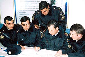 Azeri police officers discuss domestic violence at a training course at the police academy in Baku, March 2007. (OSCE)