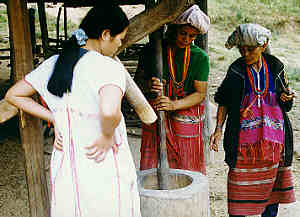 Working Karen Women, Karen Village in Chiang Mai Province, Northern Thailand.