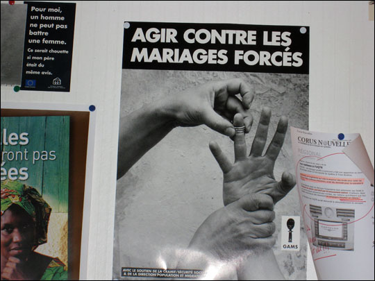 A poster against forced marriages at the office of GAMS