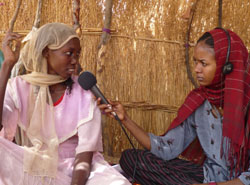 Internews journalist interviews a refugee woman
