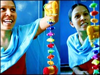 Indian women making handicrafts