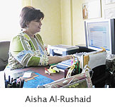  Aisha Al-Rushaid typing at a computer