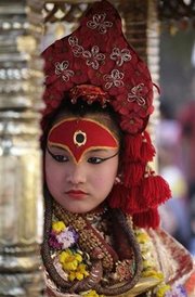 Kumari is brought out for the public to worship during the Chaitya Dasain festival in Kathmandu April 13, 2008. (Shruti Shrestha/Reuters)