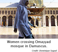 Women crossing Omayyad mosque in Damascus.