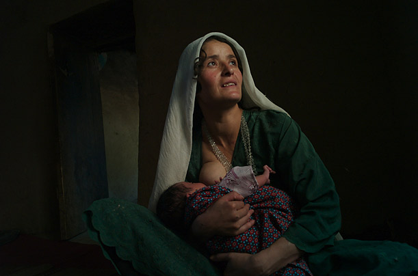 Siamoy feeds her one-month old baby in Badakshan, where a harsh landscape and lack of infrastructure have given rise to an astonishingly high rate of deaths during childbirth.