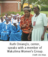  Ruth Oniang'o, center, speaks with a member of Wakulima Women's Group.