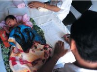 Cambodian newborn being registered