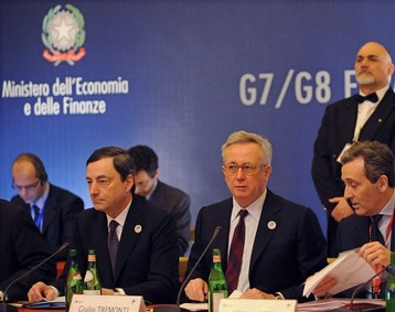 Italian Finance Minister Giulio Tremonti (C) is flanked by the Governor of the Bank of Italy Mario Draghi (L) and Director General of the Italian Treasury Vittorio Grilli  before he opens a working session of a G7 Finance Ministers and Central Bank Governors&#039; meeting on February 14, 2009 in Rome. Group of Seven finance ministers got to work to hammer out an action plan to confront deepening recession, amid mounting warnings of the talks&#039; grave economic stakes. From Getty Images by AFP/Getty Images.