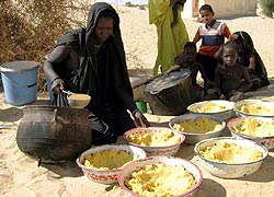 Food preparation near the desert, Mali.  WHH