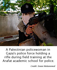 A Palestinian policewoman in Gaza's police force