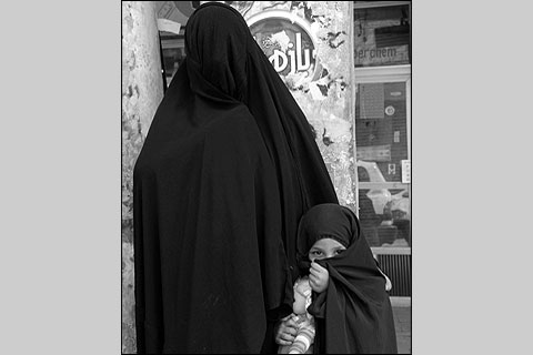 2. Najaf: Some Muslim women cover their facesentirely with a niqab.
