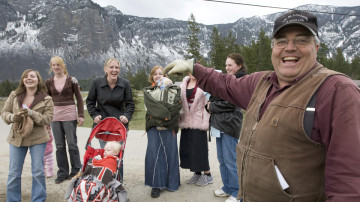 Winston Blackmore, the religious leader of the polygamous community of Bountiful located near Creston, B.C., shares a laugh with six of his daughters and some of his grandchildren in an April, 2008 file photo. Jonathan Hayward/The Canadian Press