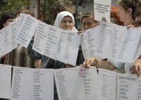 Bosnian Muslim women protest the UN war crimes tribunal's failure to charge two men with rapes they committed in the 1992-95 war