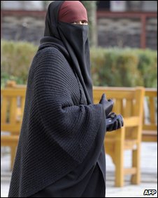 A woman wears a full-length veil in Lyon, 25 January 