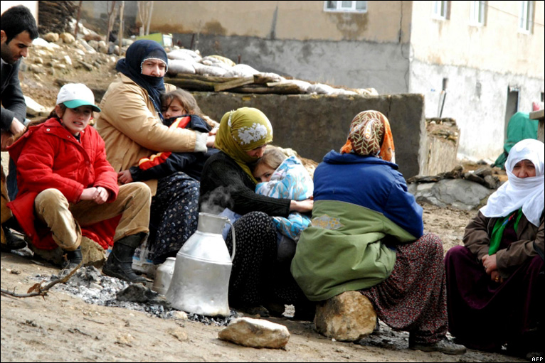 Villagers huddle together in Elazig