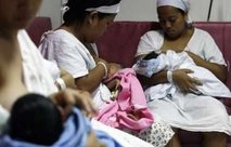 Mothers breast feed their newly born babies inside Neonatal Intensive Care Unit (NICU) at Fabella hospital in Manila