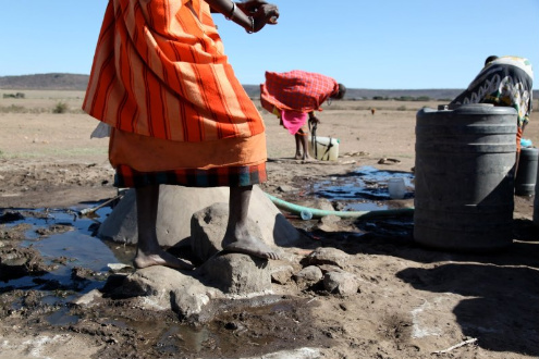 Women gather water, Kenya