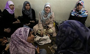 alestinian girls at a Koran studies day camp for girls in Gaza City. 