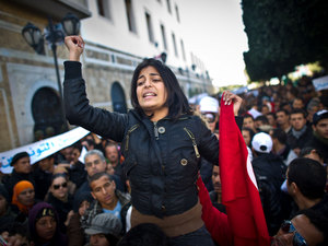 A woman participates in a demonstration in Tunis on January 22, 2011.