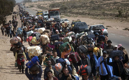 Refugees held in Libya (Pic:AP)