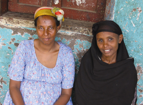 Ethiopian women in front of building