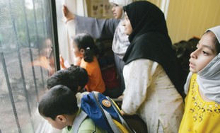 Muslim women and children (illustrative).
