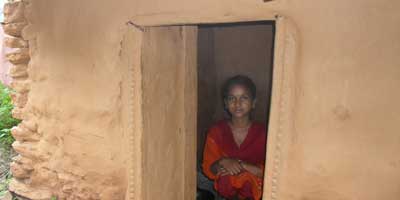 Kamala Vishwarkarmas sits inside her goth, where she has been staying alone during the week of her monthly period. 'Chhaupadi, the Nepalese practice of segregating menstruating women from their houses and men, was outlawed by Nepal's supreme court in 2005 