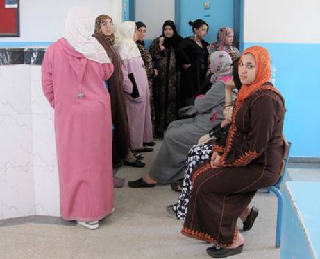 Pregnant Sookaina Boudraa waits for her turn at Casablanca's Alwaha health clinic