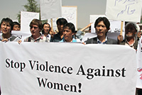 Afghan rights activists attend a rally to stop violence against women in Kabul  EPA/S. SABAWOON