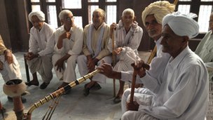 Men smoking pipes in the rural district of Jind, a short drive from Delhi