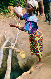 Anna Mulambe from Zambia collecting water