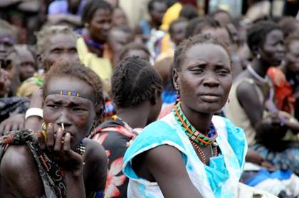 Women of the Murle ethnic group in South Sudan. The practice of child marriage is still supported in many South Sudanese communities, where girls are seen as a source of wealth because of the bride price families are paid. Credit: Jared Ferrie/IPS