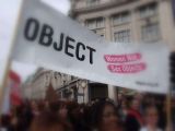 Banner at a demonstration saying: Object - women not sex objects