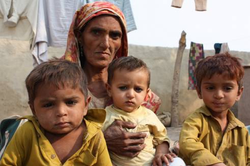 Izzat Mai, 60, from Pakistan and her grandchildren. 