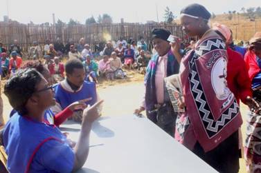 Women in Swazilands Ekwendzeni Chiefdom register to vote for the primary election. Analysts say that chauvinistic practices are being used to prevent women from participating in the Aug. 24 elections. Credit: Mantoe Phakathi/IPS