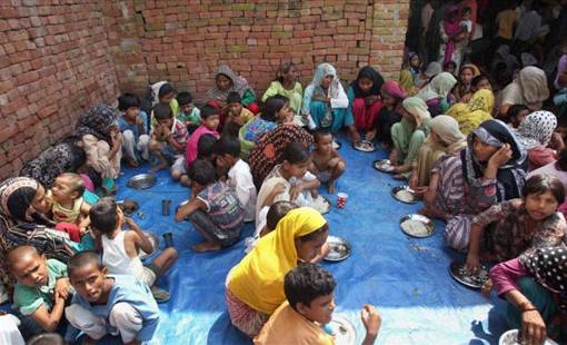 Riot-affected women and children at a makeshift camp in Muzaffarnagar.