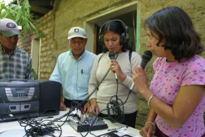 Women broadcasting from Honduran community radio station; picture by COPINH
