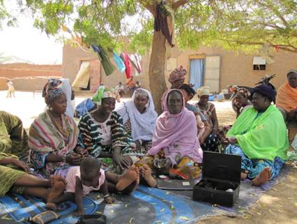 A weekly savings group meeting in Mali by Trickle Up participants.
