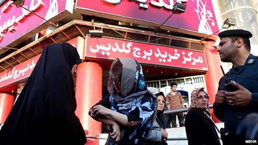 Tehran police round up women for their "inappropriate" dress in July 2012.