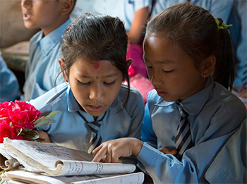Girls at school in Nepal. Credit: Aubrey Wade/Oxfam