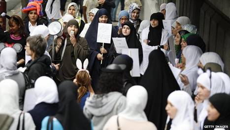 Veiled women protest against the ban of the headscarf, worn by Muslim girls, at schools on the first day of the new school year in Antwerp on 1 September 2009. 