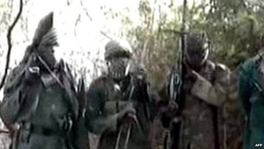 Video grab obtained by AFP on 5 March 2013 showing hooded Boko Haram fighters in undisclosed place