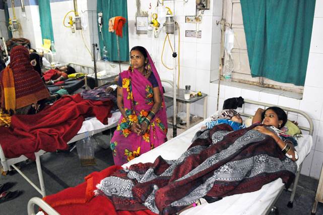 Women who underwent sterilization surgery receive treatment at the Chhattisgarh Institute of Medical Sciences in Bilaspur on Tuesday.
