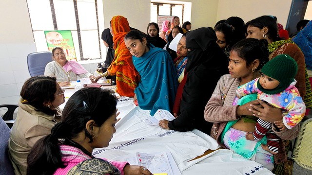 Women register for a free sterilization procedure at the Mohan Lal Gautam District Women's Hospital in Aligarh, India, in a file photo from February 2011.