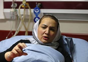 Afghan member of parliament Shukria Barakzai, speaks during an interview at a hospital after having survived an attack on November, in Kabul December 27, 2014.  REUTERS/Mohammad Ismail
