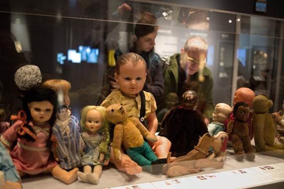 Dolls belonging to Jewish children victims of the Holocaust are displayed at "Children in the Holocaust: Stars Without a Heaven", a new exhibition of the Yad Vashem Holocaust memorial museum, in Jerusalem (Menahem Kahana (AFP/File))
