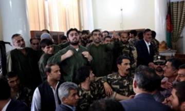 Defendants speak during their trial on charges relating to the mob killing of Farkhunda in Afghanistans primary court.
