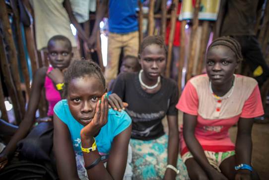 Newly arrived unaccompanied minors from South Sudan wait as they undergo registration in Kule camp, Ethiopia.